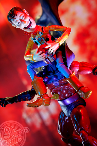 Illustration for article titled Creepy Woody Trolling the World's Coolest Figures and Toys